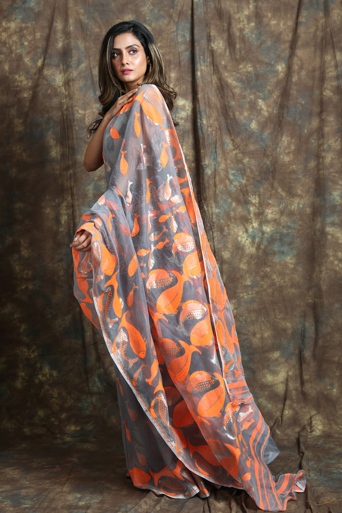 The Azure Blue Color Saree Is Crafted With Orange & Silver Zari Fish Motive Work All Over The Body And Pallu - Charukriti.co.in