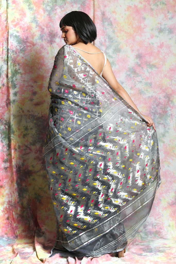 This Grey Jamdani Saree By Charukriti Is Crafted In Cotton And Features Silver Zari Minakari Weaving Details All Over - charukriti.co.in